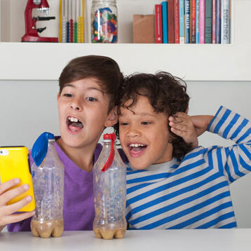 Family exploring one of our science apps together